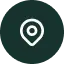A white map location pin icon with a circular dot in the center, displayed on a dark green hexagonal background.